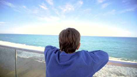 Young-Boy-Looking-Out-Over-Ocean-03