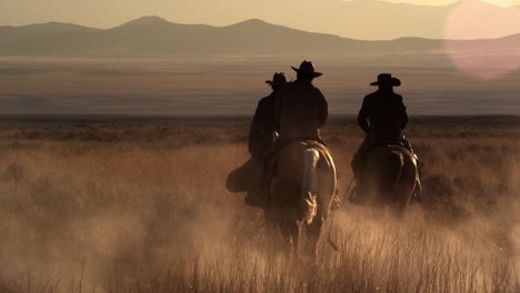 Cattlemen-Riding-Horses-at-Sunset-01
