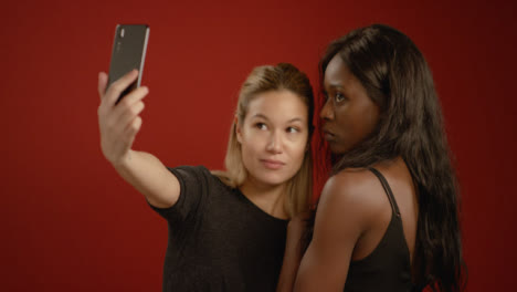 Young-Women-Pout-and-Take-Selfies