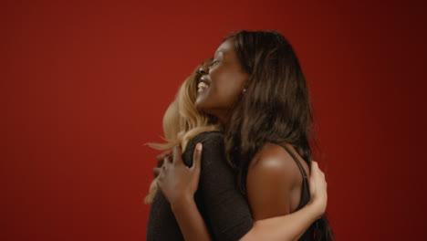 Two-Women-Hug-Each-Other