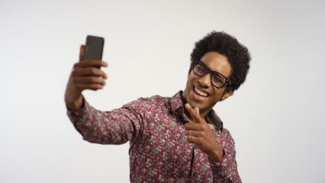 Young-Man-Take-Selfies-on-Phone