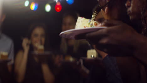 CU-Woman-Holds-plate-of-Birthday-Cake