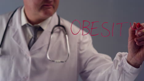 Doctor-Writing-the-Word-Obesity