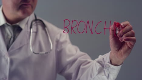 Doctor-Writing-the-Word-Bronchitis