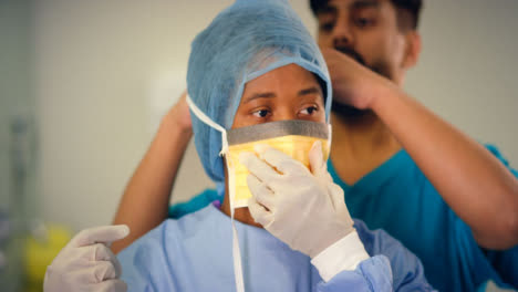 CU-Medical-Staff-Putting-On-Surgical-Mask