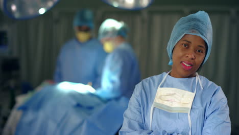Portrait-Of-Female-Surgeon-In-Operating-Theatre