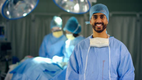 Portrait-of-Smiling-Surgeon-in-Operating-Theatre