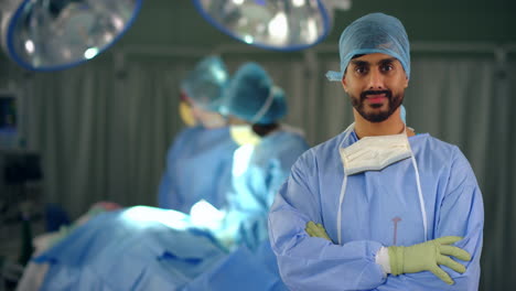 Surgeon-Looking-to-Camera-in-Operating-Theatre