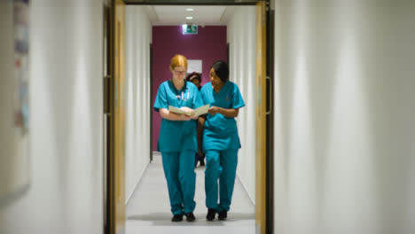 Medical-Staff-Walking-Through-Hospital