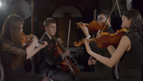 Tilting-Up-Shot-of-String-Quartet-Playing