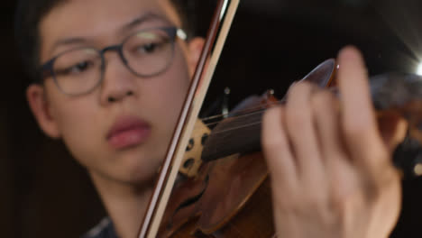 -Close-Up-Violin-Played-by-Male-Violinist