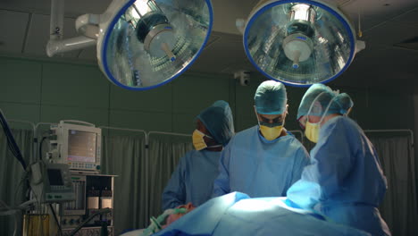 Medical-Staff-Look-at-Monitor-During-Surgery