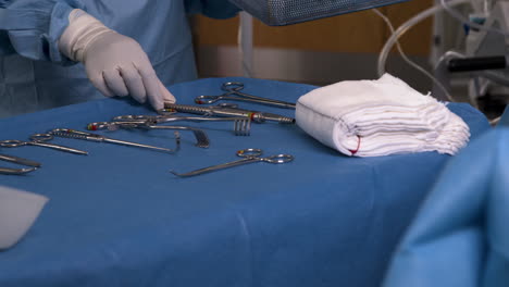 Medical-Worker-Preparing-Surgical-Tools