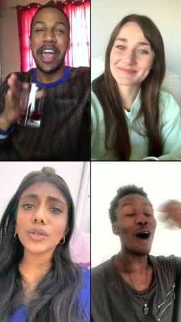 Four-Friends-Laughing-And-Joking-Over-Video-Chat,-Vertical