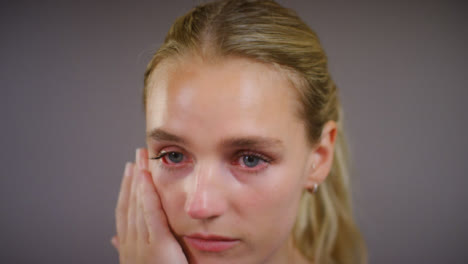 Emotional-Young-Blonde-Woman-Crying