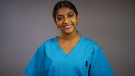 Young-Female-Doctor-Smiling-at-Camera