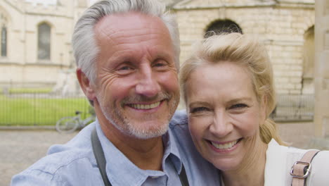 POV-Shot-of-Middle-Aged-Tourist-Couple-Taking-a-Selfie