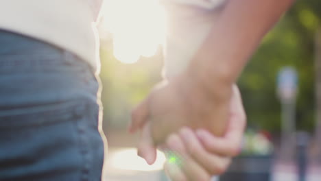 Extreme-Close-Up-of-Couple-Holding-Hands