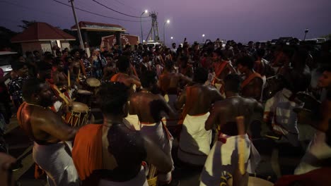 Varkala-Kerala--India--January-01-2020-Wide-angle-shot-of-musicians-playing-Chenda-an-Indian-percussion-instrument-at-Varkala-beach-on-the-eve-of-new-year