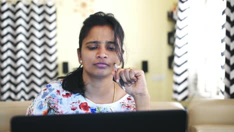Closeup-of-an-Indian-business-woman-thinking-deeply-and-working-from-home-due-to-the-covid19-coronavirus-lockdown.