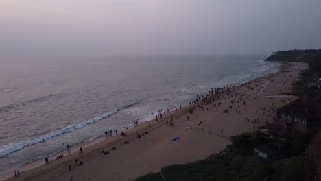 Wide-angle-panning-shot-of-the-beautiful-Cliff-beach-in-Kerala-during-sunset