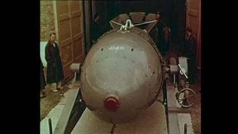 1956-Soviet-Atomic-Bomb-Being-Loaded-Onto-Plane