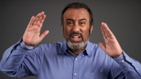 Visibly-Angry-Middle-Aged-Man-Shouting-Portrait