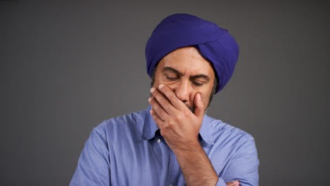 Concerned-Middle-Aged-Man-In-Turban-Portrait