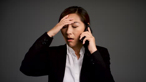 Frustrated-Middle-Aged-Woman-On-Phone-Portrait