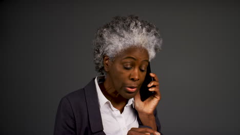 Angry-Middle-Aged-Woman-On-Phone-Portrait