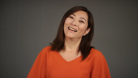 Middle-Aged-Woman-Smiling-and-Laughing-Portrait-