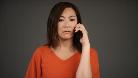 Middle-Aged-Woman-Receives-Bad-News-Over-Phone-Portrait