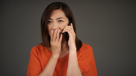 Middle-Aged-Woman-Receives-Bad-News-Over-Phone-Portrait