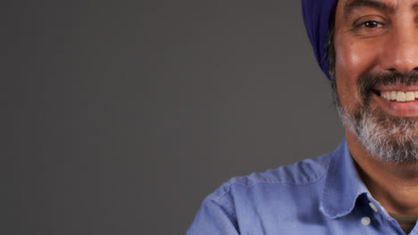 Middle-Aged-Man-In-Turban-Smiling-with-Copy-Space