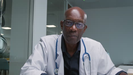 Middle-Aged-Male-Doctor-Receives-Bad-News-on-Video-Call