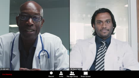 Middle-Aged-and-Young-Male-Doctors-Having-Video-Meeting