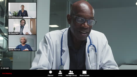 Middle-Aged-Male-Doctor-Gives-Good-News-During-Video-Conference