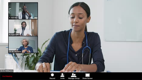 Young-Female-Doctor-Leading-Video-Meeting-with-Colleagues
