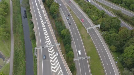 Drone-Shot-Following-Train-Passing-Underneath-Motorway-Bridge-01