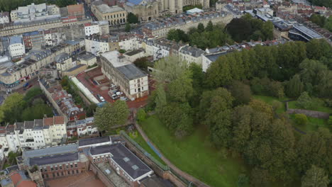 Drone-Shot-Rising-Over-Treeline-In-Bristol