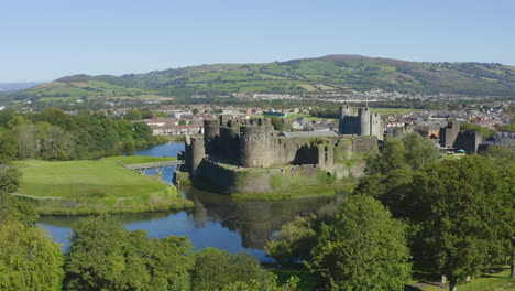 Drone-Shot-Orbiting-Caerphilly-Castle-and-Moat-In-Wales-Short-Version-1-of-2