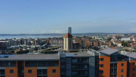Drone-Shot-Rising-Over-Apartment-Building-Revealing-Swansea-Marina-01