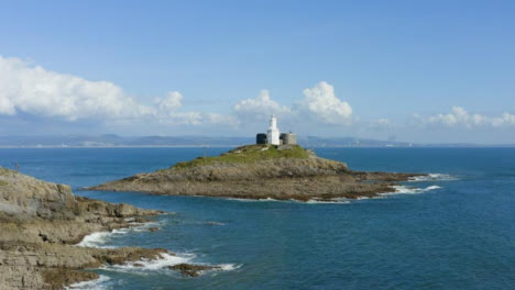 Drone-Shot-Orbiting-Mumbles-Lighthouse-In-Swansea-Long-Version