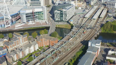 Drone-Shot-Orbiting-Train-Travelling-Through-Central-Cardiff-