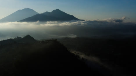 Drone-Shot-Orbiting-Mount-Batur-Volcano-In-Distance