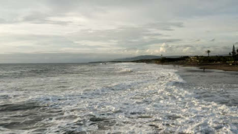 Drone-Shot-Flying-Over-Waves-at-Pigstone-Beach