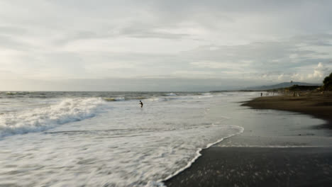 Drone-Shot-Flying-Over-Waves-Crashing-at-Pigstone-Beach