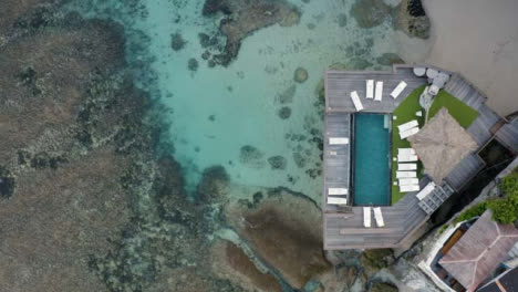 Drone-Shot-Descending-On-Pool-at-Coastal-Property-Near-Uluwatu-Beach