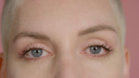 Extreme-Close-Up-Shot-of-Female-Model-Opening-Her-Blue-Eyes