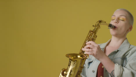 Portrait-Shot-of-Model-Playing-an-Alto-Saxophone-